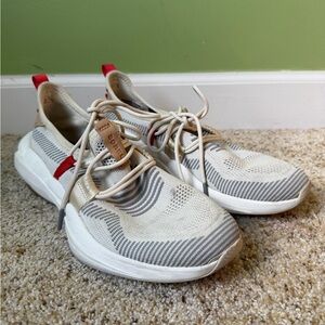 Sorel Neutral Knit Slip-On Sneakers with Red Pull Tabs